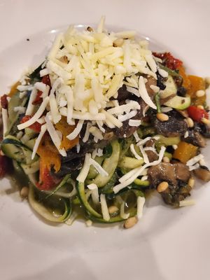 Zucchini spaghetti with vegan cheese at La Tabella in Airlie Beach