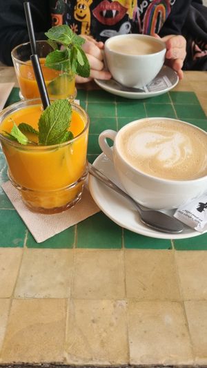 Orange juice & coffee with oat milk at Picknick Cafe - City in Frankfurt