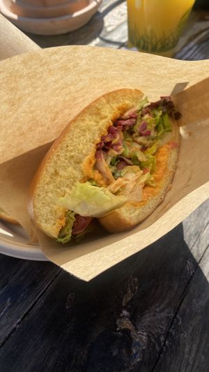 Miso mushroom burger cut into two for sharing  at Ibiza bowls in Copenhagen