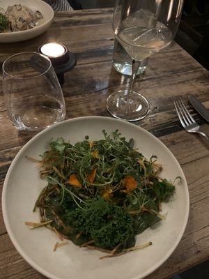 Main dish. Green mushroom risotto with crispy potato sticks  at Høst in Copenhagen