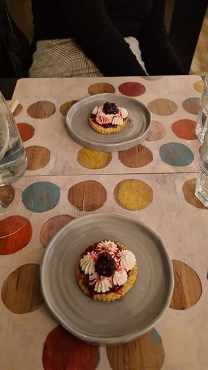 Frolla al pepe rosa con ricotta di mandorle e composta di visciole at Indigeno Roma in Rome