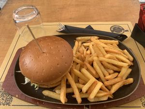 Vegan burger and fries  at La Follia in Rome