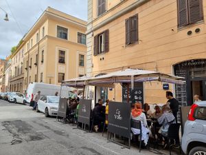 Outdoor seating at La Follia in Rome