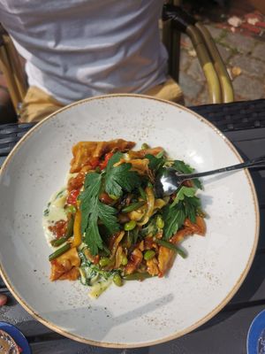 Pasta with vegetables, tzaziki and seitan. at Festland in Krummhoern