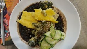 Balkan prebranch, grilled broccoli with tahini, celery purée, baked polenta, zucchini salad with chilli. at Veggie Garden in Orlando