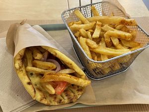 (vegan) Chicken souvlaki (€4) with French fries (€4).  at Mama Tierra - Acropolis in Athens
