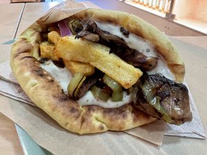 Indian mushroom gyro (with raita sauce )  at Mama Tierra - Acropolis in Athens