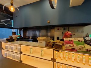 View from inside, counter and kitchen. at Mama Tierra - Acropolis in Athens