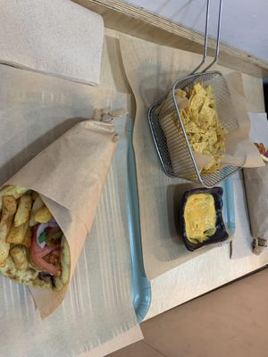 Chicken souvlaki and nachos with vegan cheese saucee  at Mama Tierra - Acropolis in Athens