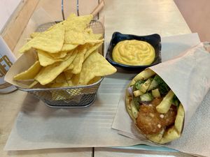 Back after a year & had chick’n souvlaki & nachos  at Mama Tierra - Acropolis in Athens