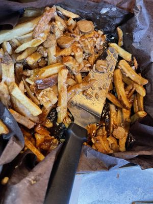 Vegan Poutine with vegan “sausages” NOT. (More like hot dogs)  at Pizza Projekt in London