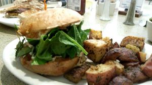 Pumpkin sausage sandwich with roasted potatoes  at Mother's Market Kitchen in Brea