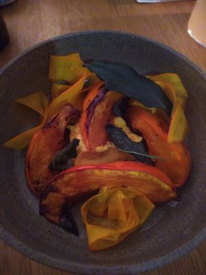 Evening menu: baked pumkin with pickled pumpkin on cashew mousse at plant. in Luzern