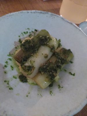 Leek on polenta with chili oil at plant. in Luzern