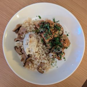 Peal couscous with fabulous marinated shiitake mushrooms at plant. in Luzern