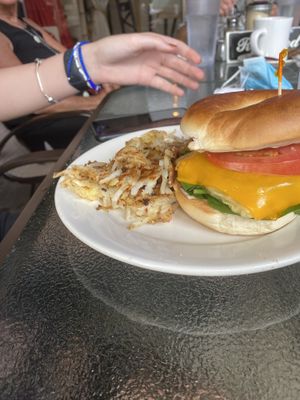 Bagel 🥯 faux egg sandwich with hash browns  at The Green Table in Palm Harbor
