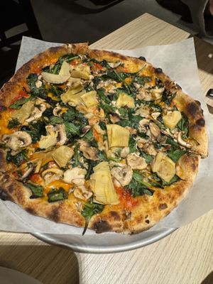 Vegan Dream with tomato sauce. They made this one by accident so they let me have it. All the pizzas were good but I think this was my favorite    at Ignite Pizzeria in Vancouver