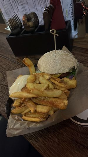 Classic burger 🍔 with fries 🍟   at Oproer Brouwerij Biercafé in Utrecht