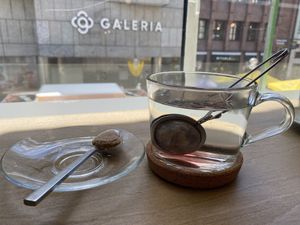 Fruit tea and window outlook  at LUSH Cafe in Munich