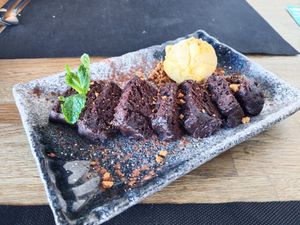 Brownie vegano con helado de mango at Yucca in St Andreu De Llavaneres