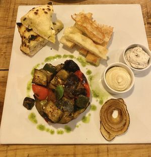 Caponata with vegan cheese and hummus, and garlic focaccia   at Arte Bianca - Cucina Italiana in Sagres