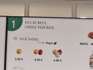 Sign above counter at Fred's in Bruges