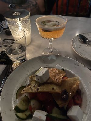 greek salad with passionfruit drink  at Koukos Rhodian Guesthouse in Rhodes