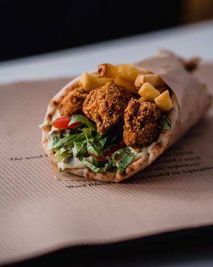 Chick n Fitty!
Chicken style tofu nuggets, white rhino sauce, lettuce, tomato, potatoes. at Rhino Vegan Beat in Mykonos