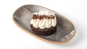 Brownies with whipped cream and chocolate pop corn at Rhino Vegan Beat in Mykonos