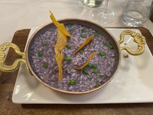 Purple risotto - could have made at home and just no flavour beyond a basic stock.  at Casa Lodi in Milan