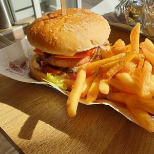 Earthling burger with fries. The burger was nice, with a lovely coleslaw, some cheese, and some fresh veggies inside. The only thing I would have changed would have been the bun -  at Earthling in Bournemouth