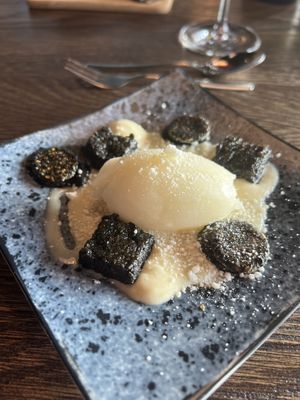 Yuzu sorbet with Yuzu ganache and black sesame cookies.  at Funken Lodge in Longyearbyen