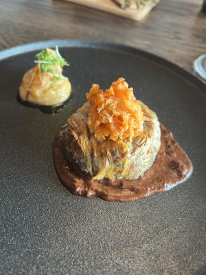 Chou farci with parsley purée and kimchi. Walnut & mole sauce.  at Funken Lodge in Longyearbyen
