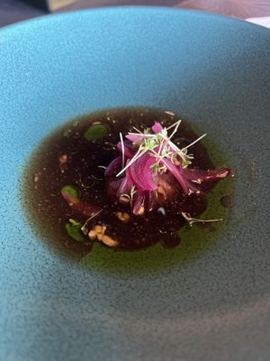 Mushroom purée, apple, onions, root vegetable broth with Japanese seaweed.  at Funken Lodge in Longyearbyen