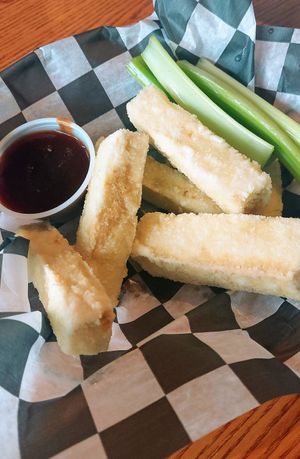 Tofu wings which are breaded sticks with a tasty sauce at Otto's Pub and Brewery in State College