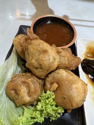Meatballs fried $7.50  10/10 esp the floral sauce!  at Red Apple 红苹果素食 - Tampines in East Singapore