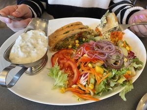 Kartoffelstampf in Blätterteig mit Kräuterquark und Salat  at Cafe Restaurant Am Flugplatz in Wyk Auf Foehr