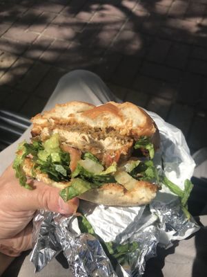 Spicy chicken burger (couldn’t hold back before taking a photo!) at Loving Hut Express - Food Cart in Vancouver
