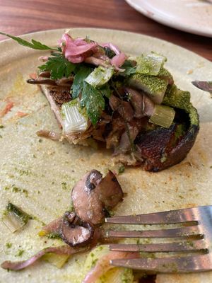 Mushroom tartine; what’s left of it.  Forgot to take a pic before tucking in.  Note the dusting of herbal mixture.    at Little Saint in Healdsburg