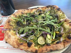 Flatbread with a delicious mix of greens 🥬   at Little Saint in Healdsburg