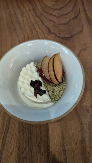 Sonoma plum dessert, sake mousse and matcha crumble at Little Saint in Healdsburg