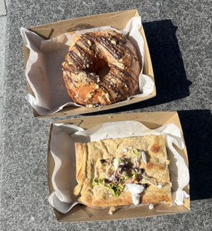 Twix donut and roast veggie quiche   at Belén Vegan Bakery in Wellington
