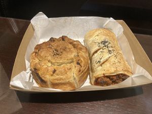 Beef/cheese mince pie (left), sausage roll (right)  at Belén Vegan Bakery in Wellington