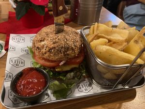 Vegan burger, rosemary chips, ketchup at Hills Burger Club in Tubingen