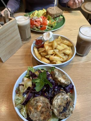 knödel bowl in the front, croissant breakfast in the back, two different chais  at Katzentempel - Leipzig Mitte in Leipzig