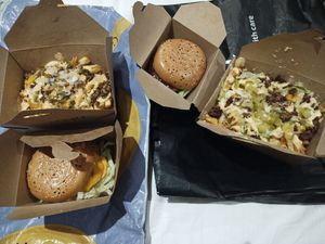 WAP and taco fries (left), Space Cowboy and Mac daddy fries (right) at The Saucy Cow in Dublin