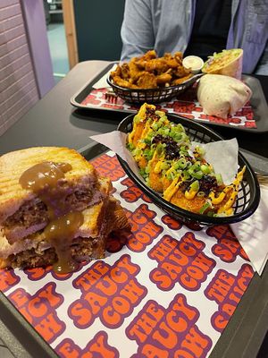 Christmas sandwich, salt & chili hasbrowns, oyster mushroom bites, spicy chicken wrap  at The Saucy Cow in Dublin