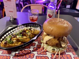 View of my full meal: Secret Saucy mushroom burger & spicy hashbrowns  at The Saucy Cow in Dublin