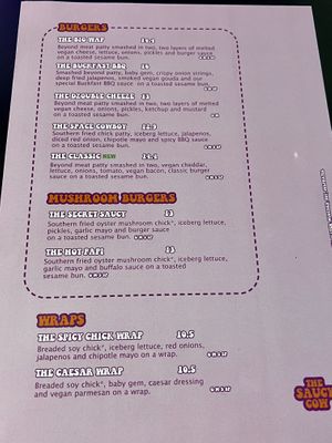 Front of the menu with the burgers & wraps  at The Saucy Cow in Dublin