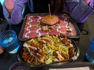 Chick*n burger and loaded fries with breaded mushroom bites at The Saucy Cow in Dublin